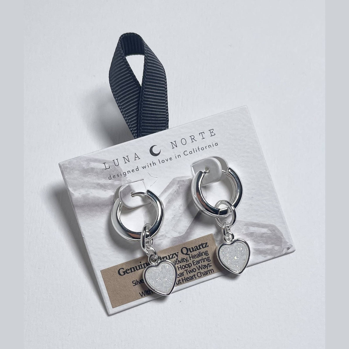 Heart's Accelerated Huggie Hoop Earring Silver